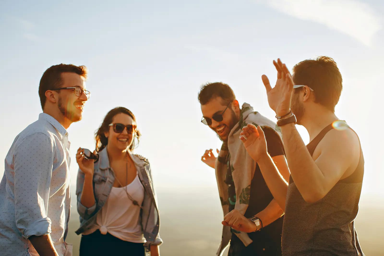 Friends laughing together on a journey